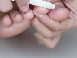 Close up of foot during a cleaning, pedicure Stock Footage