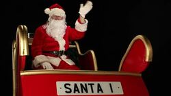 Father Christmas waving from his sleigh Stock Footage
