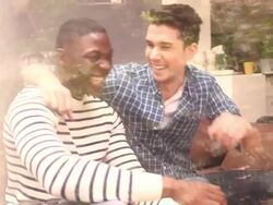 MS PAN Two young men playing cards Stock Footage