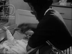 A woman's morning routine, c.1960 Stock Footage