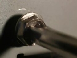 screwdriver to unscrew a screw Stock Footage