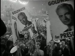 A crowd of delegates wave Barry Goldwater and Richard Nixon posters during a U.S. Presidential rally at Cow Palace, San Francisco, California. News Clip