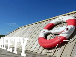 Life belt hanging on wooden pier or boat at midday Stock Footage