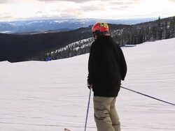 A man skiing down a snow-covered mountain in the winter. Stock Footage