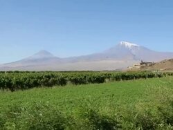 Khor Virap monastery, view of the church of the Holy Mother of God, Saint Astvatsatsin and the Ararat mountain in the background Stock Footage