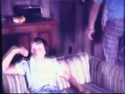 1970s Girl Playfully Posing to Camera (Shot on 8mm Film) Stock Footage