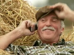 HD: Farmer On The Phone Stock Footage