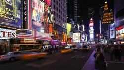 Neon lights flash over 42nd Street in Manhattan. Stock Footage