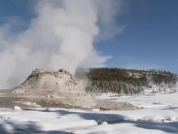 MS Geyser erupting in snowy landscape / Yellowstone National Park, Wyoming, United  Stock Footage