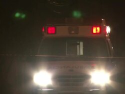 MS Shot of Ambulance arriving at crime scene AUDIO / Ciudad Juarez, Juarez, Mexico Stock Footage