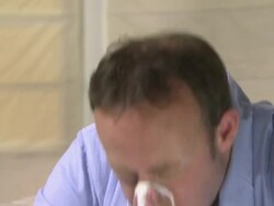 Man sneezing Stock Footage