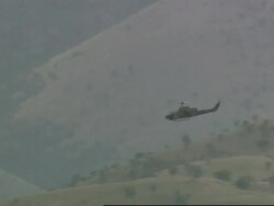 Cobra attack helicopters fire rockets into Kurdish rebel positions News Clip