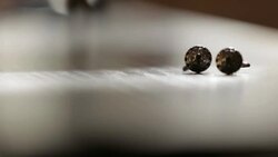 Cufflinks on the table cinematic shoot Stock Footage