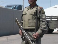 April 9 2009 MS TU PAN Mexican Soldiers searching car,  Mexican and US border, Juarez, Chihuahua, Mexico, AUDIO Stock Footage