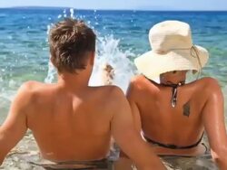 HD: Couple Having Fun On The Beach Stock Footage