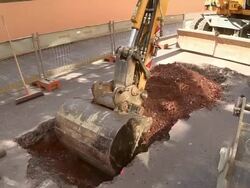 MS Shot of workmen Engraving on street for works at sewage pipe / Saarburg, Rhineland Palatinate, Germany Stock Footage