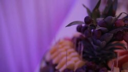 MEDIUM SHOT PANNING Desserts, cakes and fruit arranged for party Stock Footage