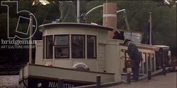 Man entering ferry at the docks, 1908 - reenactment Stock Footage