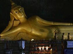 MS View of  Reclining Buddha in Cave Temple  AUDIO / Phang Naga, Phang Nga, Thanland Stock Footage