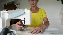 Woman sewing on machine Stock Footage