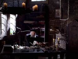 Nostradamus reads at his desk. Stock Footage