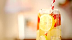 Infused Water with Fresh Strawberries, Lime, Lemon and Basil Stock Footage