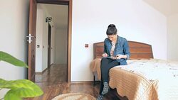 Young female shopping online using a digital tablet. Stock Footage