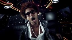 Hip-hop star dances for camera while fans pound on windows and wave at awards show Stock Footage