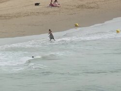 MS AERIAL Shot of people enjoying on beach at Valras-Plage city / Languedoc Roussillon, France Stock Footage
