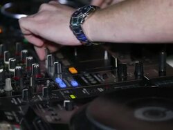DJ works for the mixing desk Stock Footage