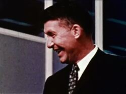 1959 close up astronaut Wally Shira wearing suit smiling / newsreel Stock Footage