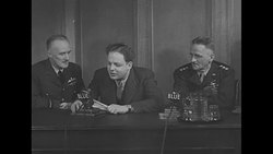 British Air Marshal Sir Richard Peck and US General Carl Spaatz speaking on radio broadcast in London during World War II News Clip
