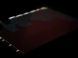 Looking At Digital Tablet Showing Graph Stock Footage