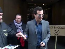 John Leguizamo (Ghetto Klown) exits the Today show in Rockefeller Center & signs for & poses with fans before getting into his car Stock Footage