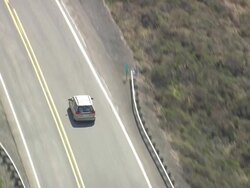 MS AERIAL TS ZO Car moving on  Oregon coast highway / United States Stock Footage