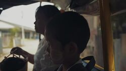 M/S Myanmar boy and mother in school bus Stock Footage