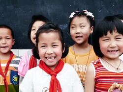 Chinese school children singing together Stock Footage