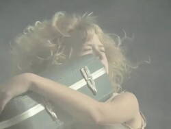 Girl with suitcase, spinning across screen Stock Footage