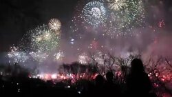 An enormous firework display erupts in the sky in celebration of the 100th anniversary of the birth of President Kim IL Sung. Stock Footage