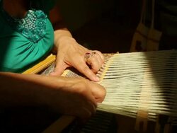 Patterned Material Being Woven on a Loom Stock Footage