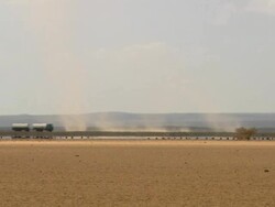 MS Storm with truck passing / Djibouti Stock Footage