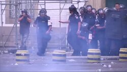 Protesters clash with police in Rio Instructional Video