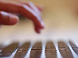 Woman using laptop Stock Footage