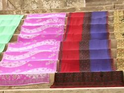 MS PAN Colorful sarees drying on steps / Varanasi, Uttar Pradesh, India Stock Footage