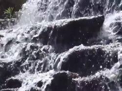 MS SLO MO Shot of Waterfall / Maine et Loire, Doue la Fontaine, France  Stock Footage