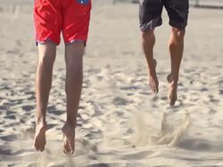 Men playing beach volleyball. - Slow Motion - filmed at 240 fps Stock Footage