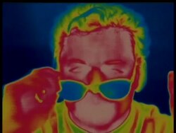 Thermographic image, CU man takes glasses off, rubs eye, replaces glasses, has a drink, identical shots with info bar on DB 302 Stock Footage