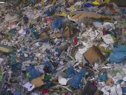 Excavator Moving Pile of Waste Stock Footage