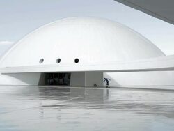 Niemeyer Centre Spain visitors roller bladeing Stock Footage