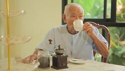 Asian senior man with vintage coffee Stock Footage